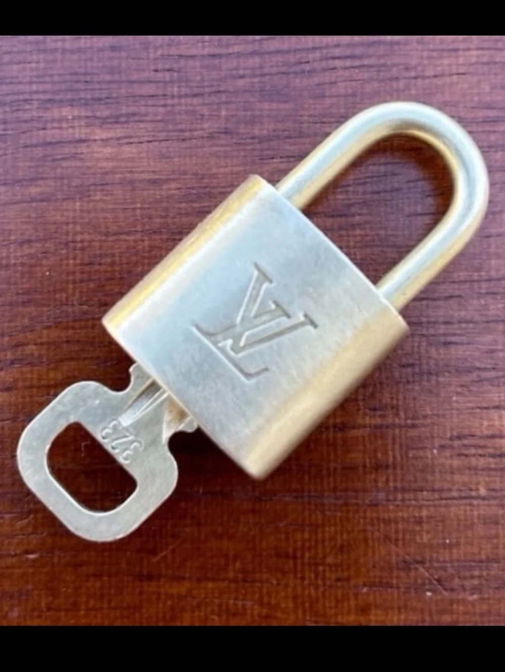 Louis Vuitton padlock with key #323